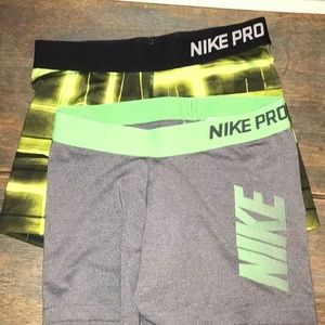 TWO PAIRS OF NIKE PRO SPANDEX